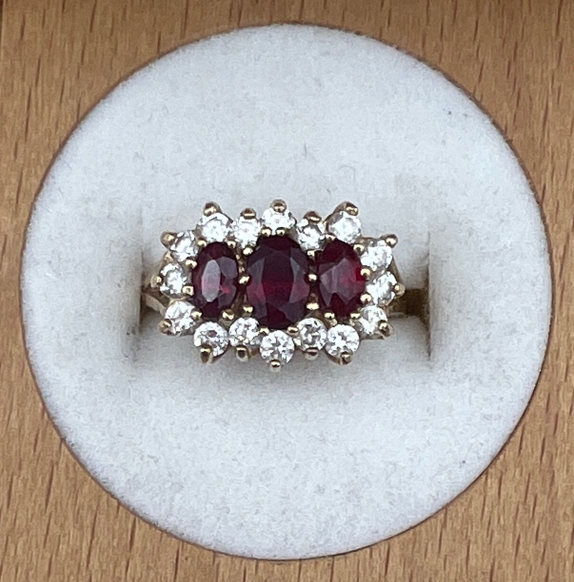 10K Gold Triple Red Stone Ring with CZ Halo Accents. Sz 6.25