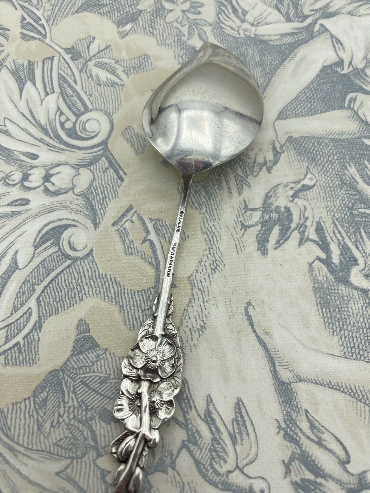 Reed & Barton Sterling Silver Floral Figural Jelly Spoon 6