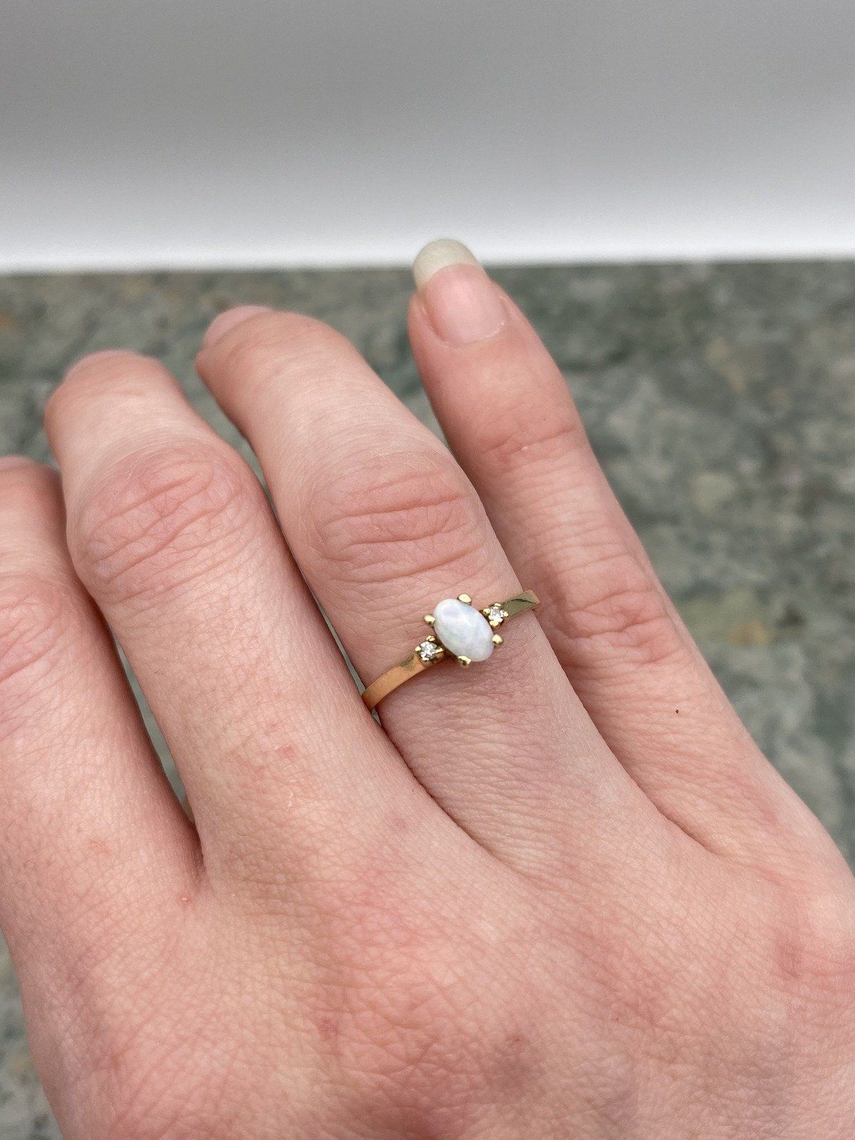 Minimalistic 10k Gold Oval Opal Diamond Flanked Ring 8