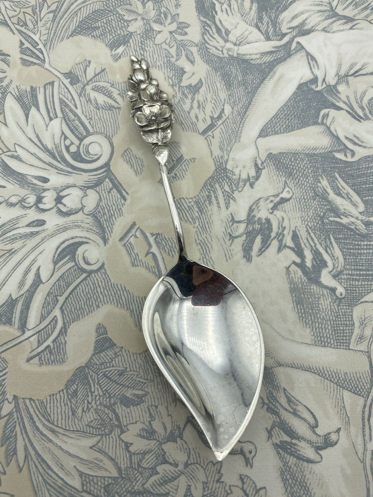 Reed & Barton Sterling Silver Floral Figural Jelly Spoon 7