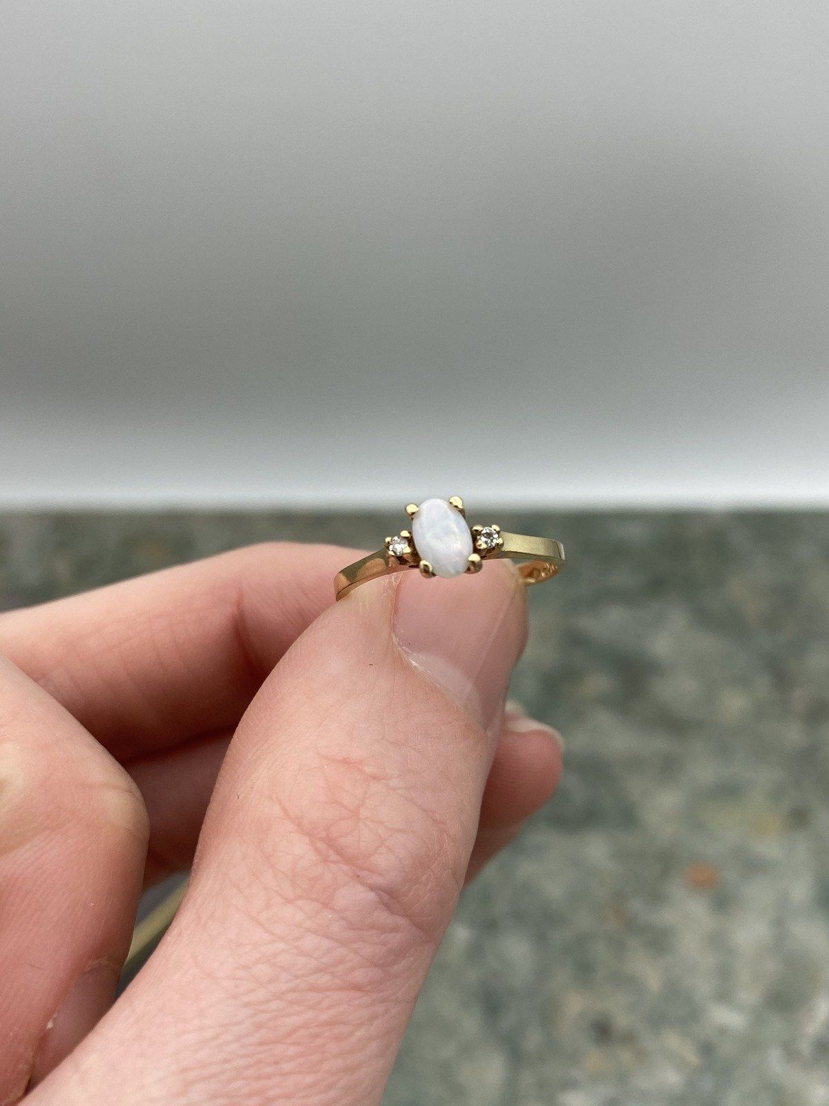 Minimalistic 10k Gold Oval Opal Diamond Flanked Ring 10
