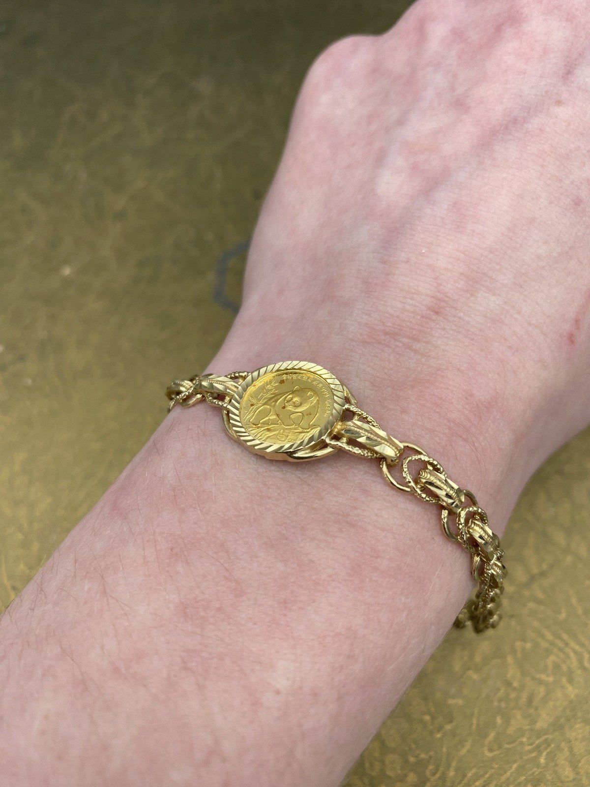 24K Gold Chinese Panda 1/10 oz Coin Bracelet with 14K Chain. 7.25L 3