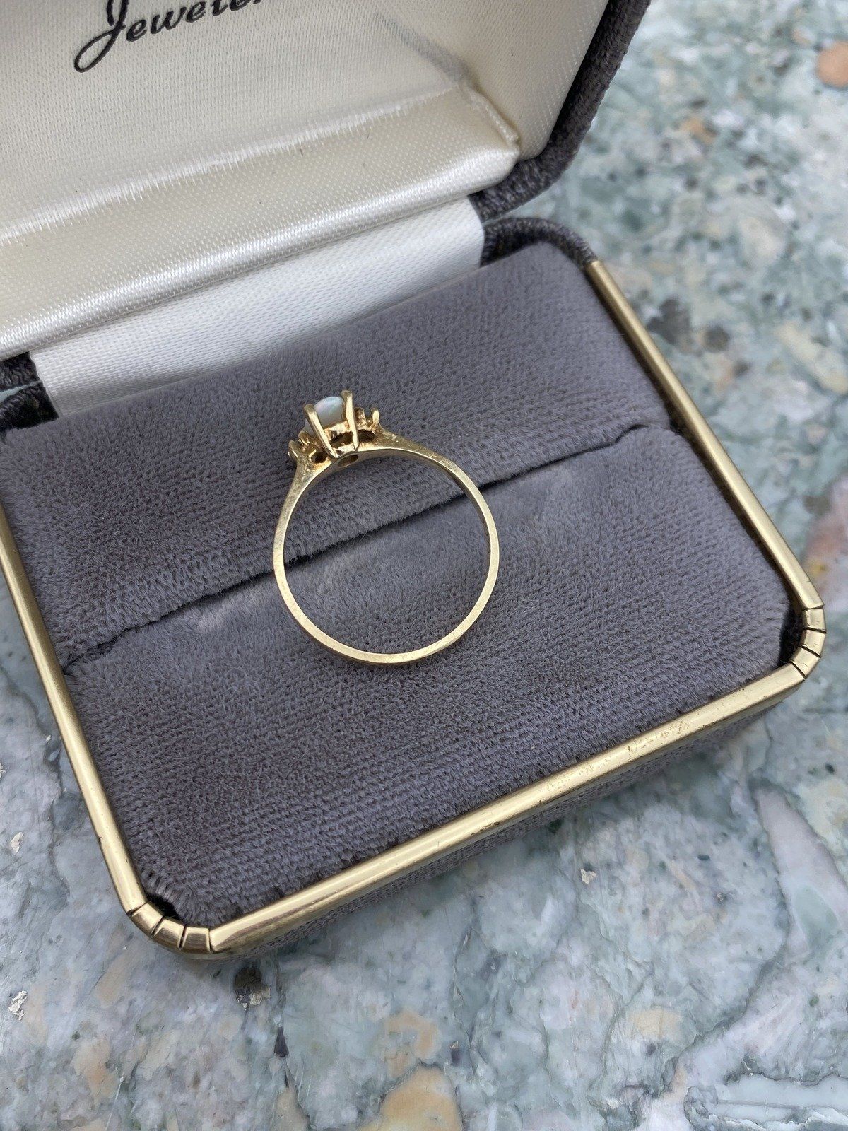 Minimalistic 10k Gold Oval Opal Diamond Flanked Ring 3