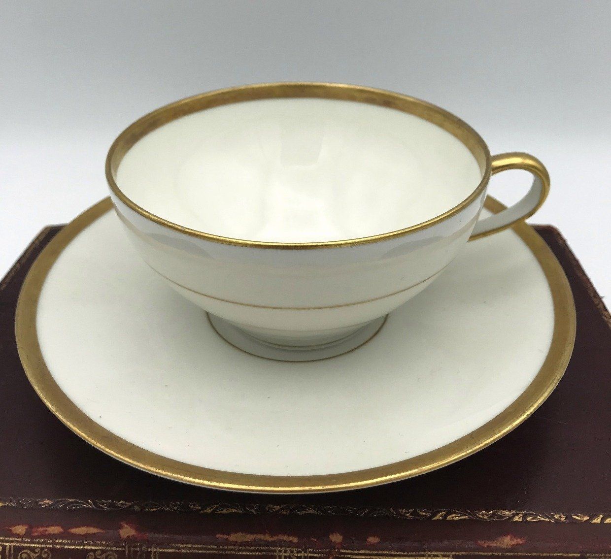 Antique Limoges C. Ahrenfeldt Gold Trimmed Tea Cup+Saucer