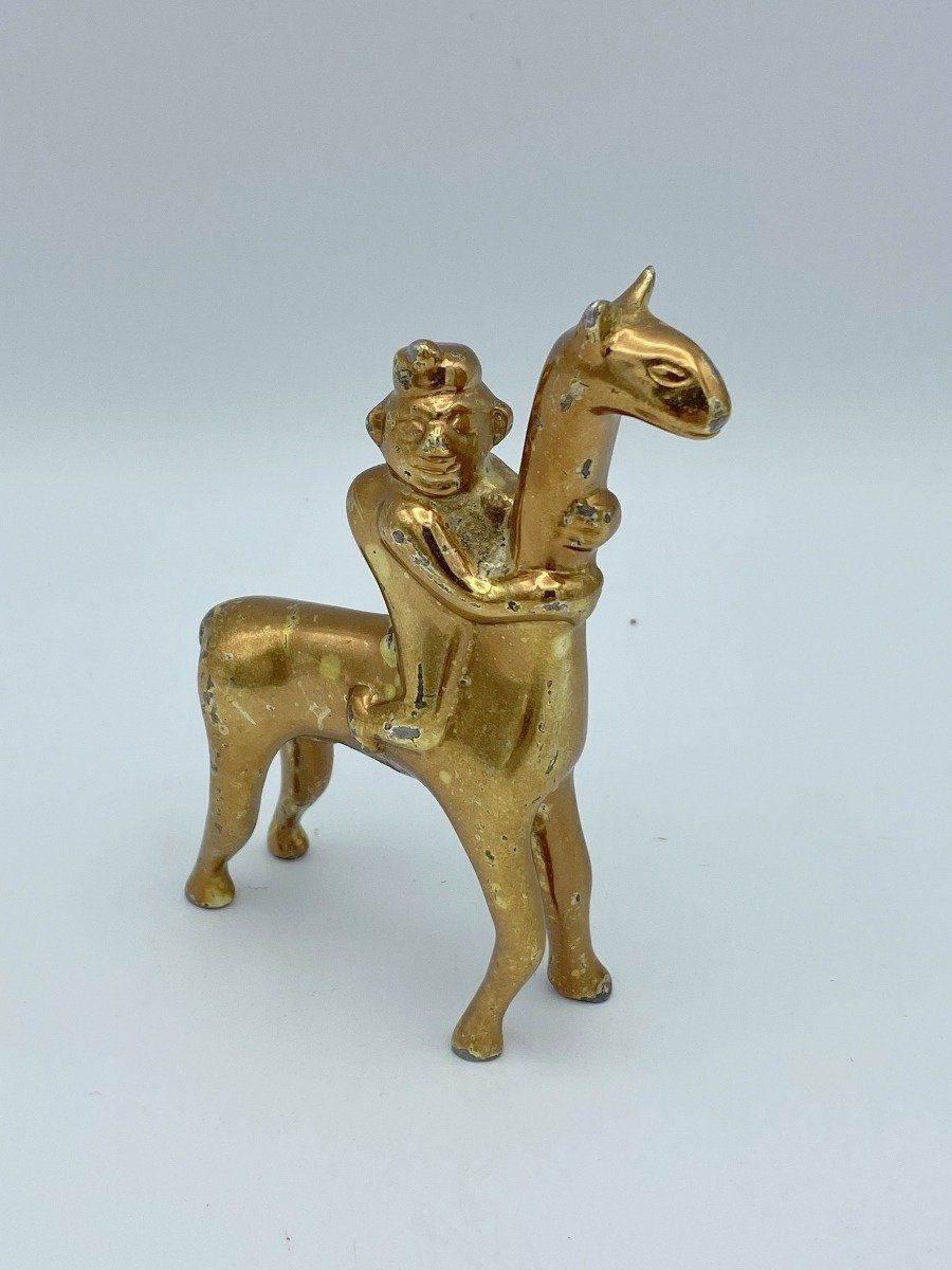 Brass Monkey Riding Llama