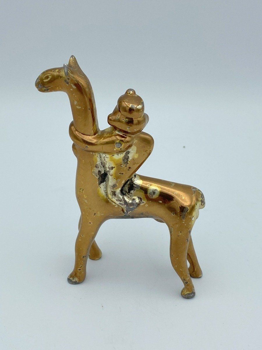 Brass Monkey Riding Llama 3