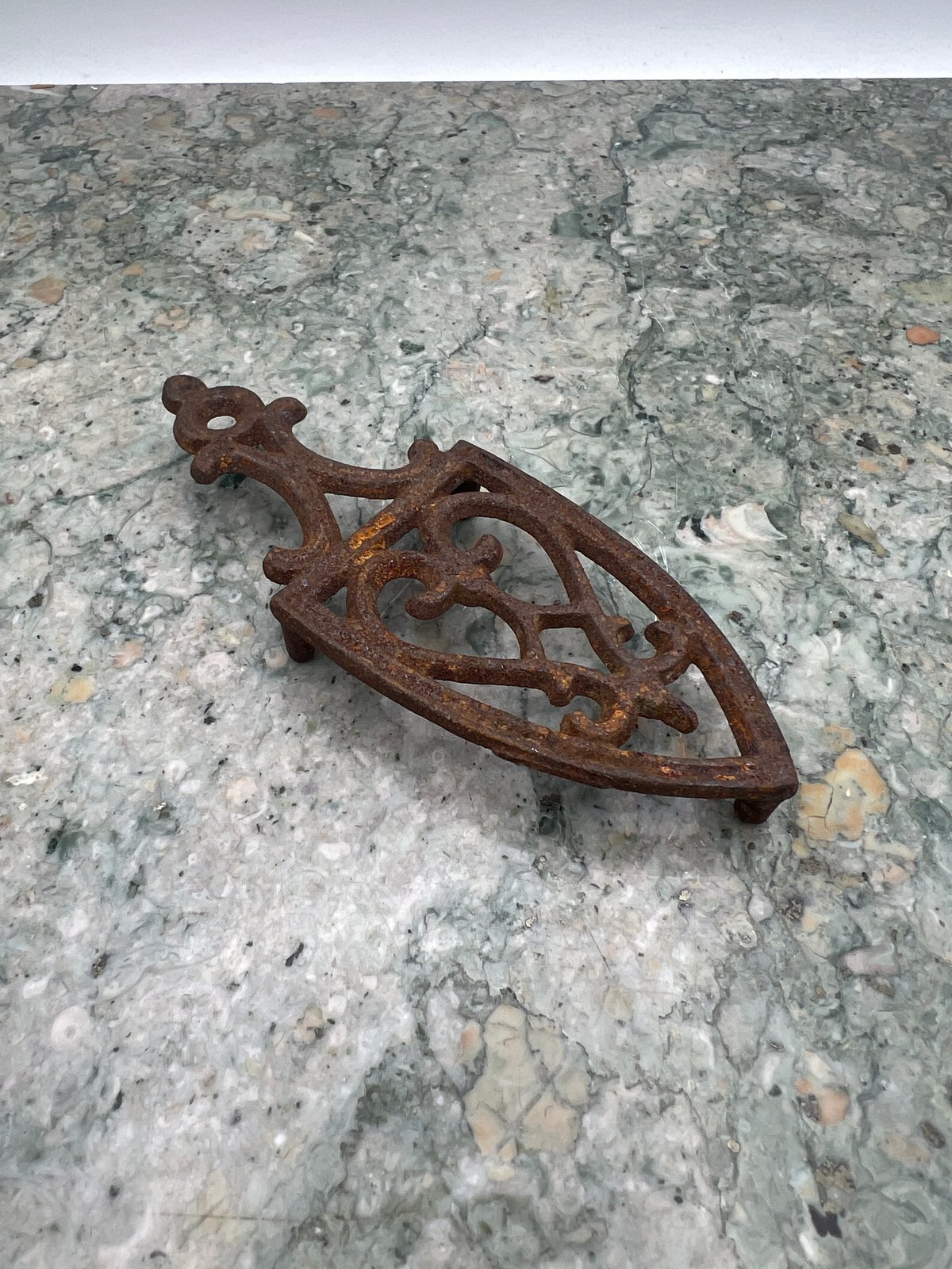 Mini Antique Cast Iron Sad Iron Trivet with Ornate Scrollwork
